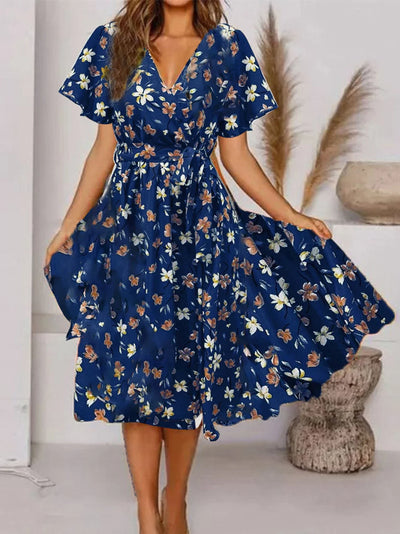 Evy | Chic Midi Dress Featuring a Romantic Floral Design