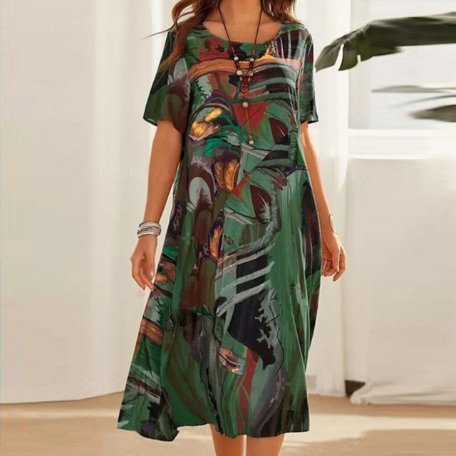 Serafina | Chic Midi Dress Featuring Abstract Print
